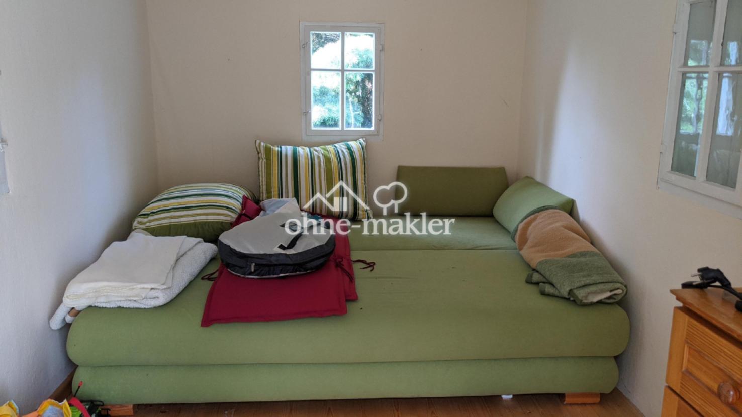 Gartenhaus innen Couch