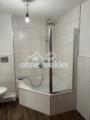 Eckbadewanne und Dusche