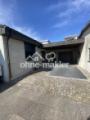 Eingang mit Carport