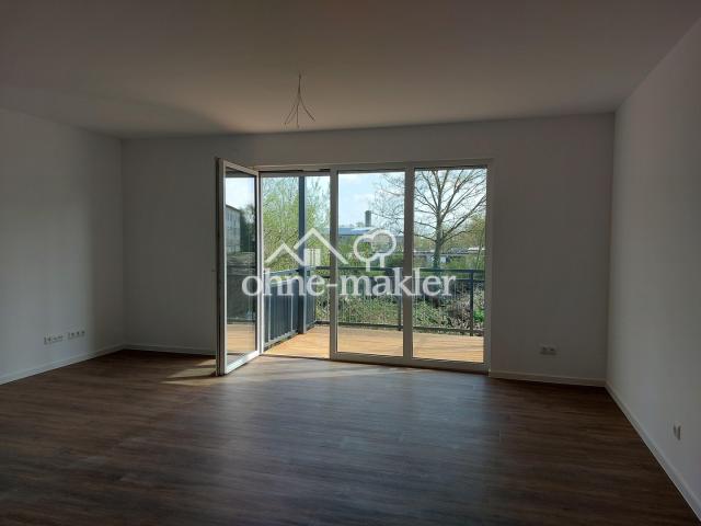 Wohnzimmer mit Balkon