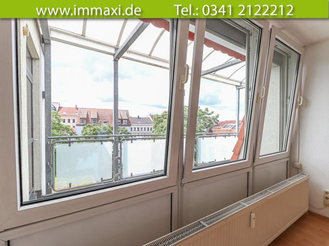 Wohnzimmer Fenster mit Blick zum Laubengang
