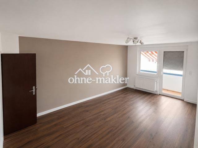 Wohnzimmer mit Westbalkon