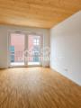 Wohnzimmer mit Balkonblick