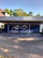 Dreier-Carport bepflanzt