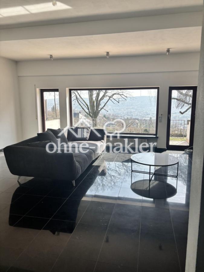 Wohnzimmer mit Stadtblick OG