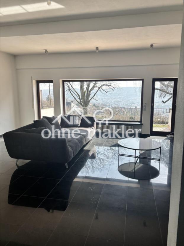 Wohnzimmer mit Stadtblick OG
