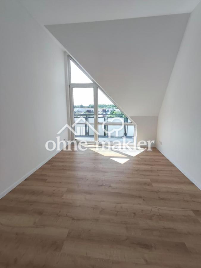 Schlafzimmer mit Balkonzugang