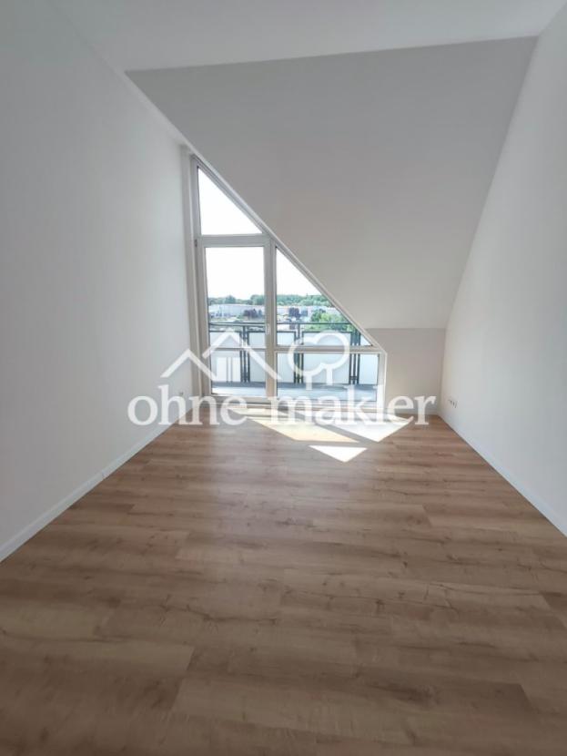 Schlafzimmer mit Balkonzugang