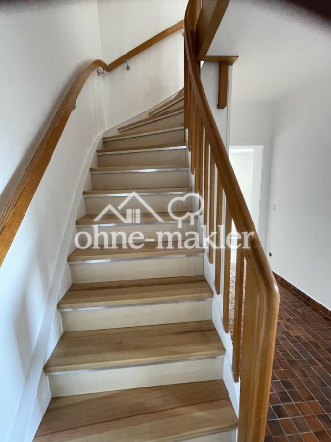 Treppe zum 1. Obergeschoß