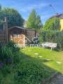 Haus B Gepflegte Gartenidylle