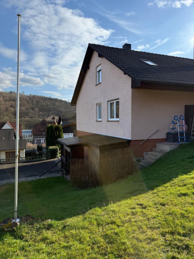 Gartenansicht mit Blick auf Überdachte Terrasse UG