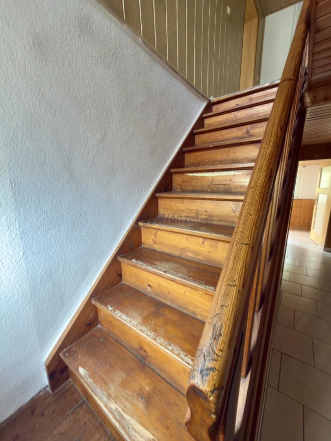 Treppenaufgang ins Obergeschoss
