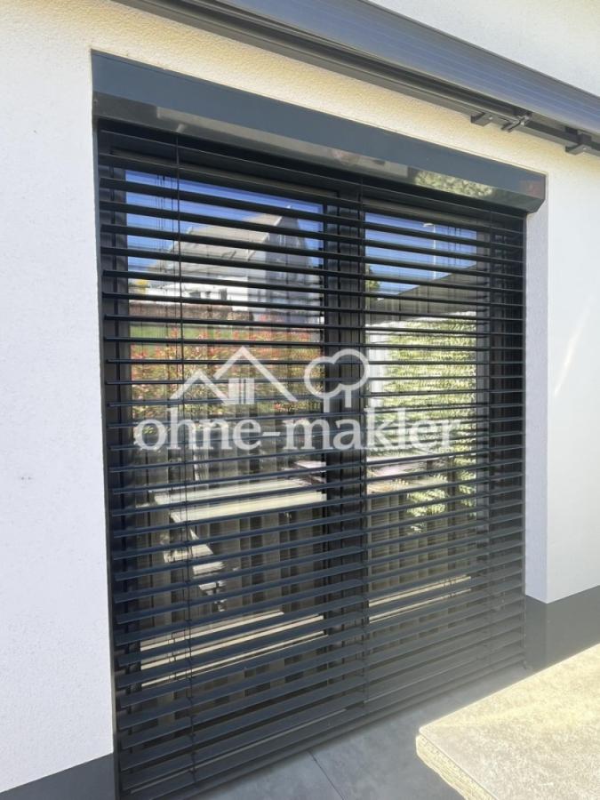 Terassenfenster mit Raffstore