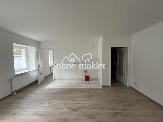 Wohnzimmer mit Küche