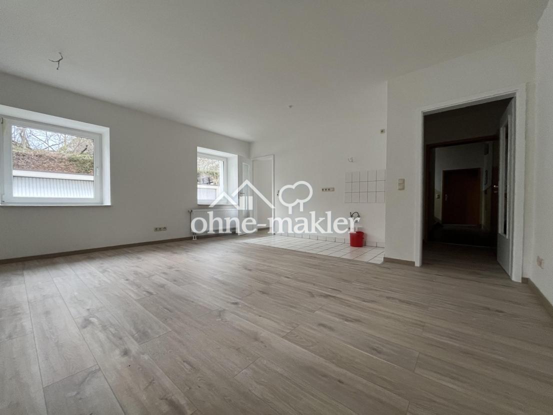 Wohnzimmer mit Küche