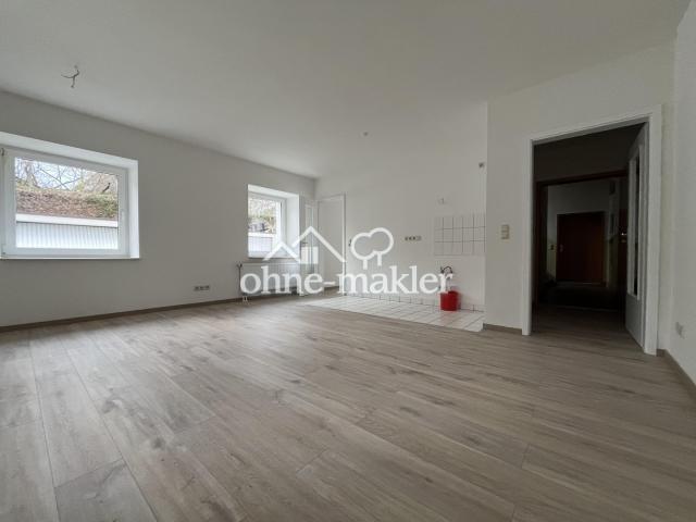 Wohnzimmer mit Küche