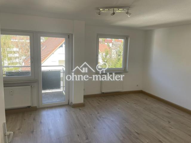 Wohnzimmer mit Balkon
