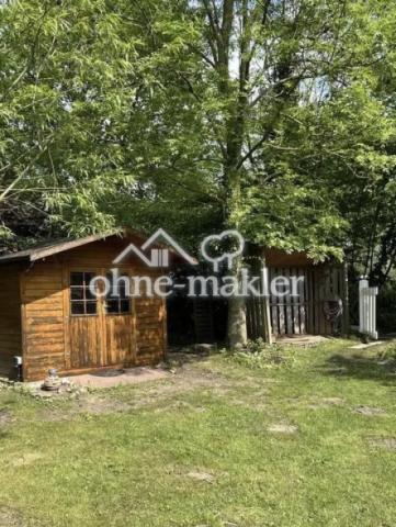 Gartenhaus und Holzlager