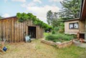 Schuppen hinter Carport