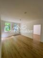 Wohnzimmer – Blick zu Fenstern