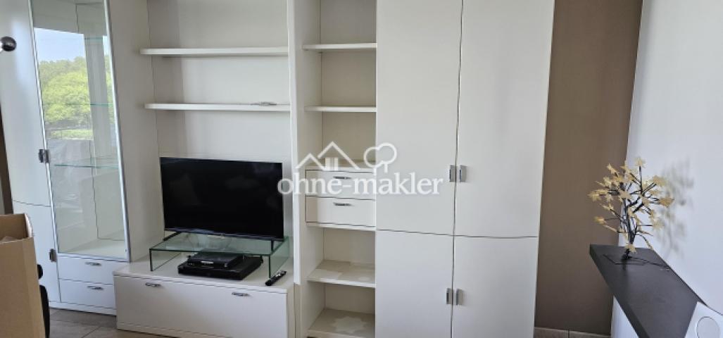 TV mit WohnzimmerSchrank