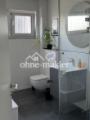 Bad mit Dusche und Badewanne
