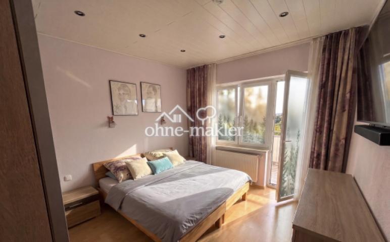Schlafzimmer mit Balkon