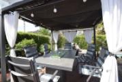 Pergola mit Sitzgruppe