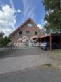 Südansicht mit Carport