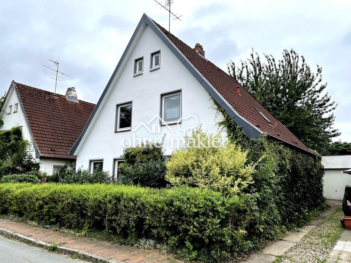 Frontseite mit Garagenauffahrt