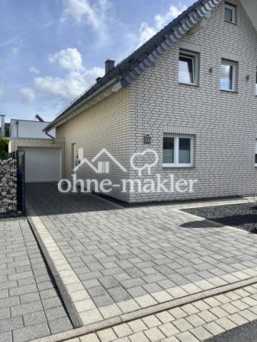 Haus + erste Garage