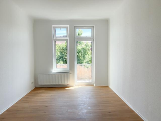 Schlafzimmer mit Balkon