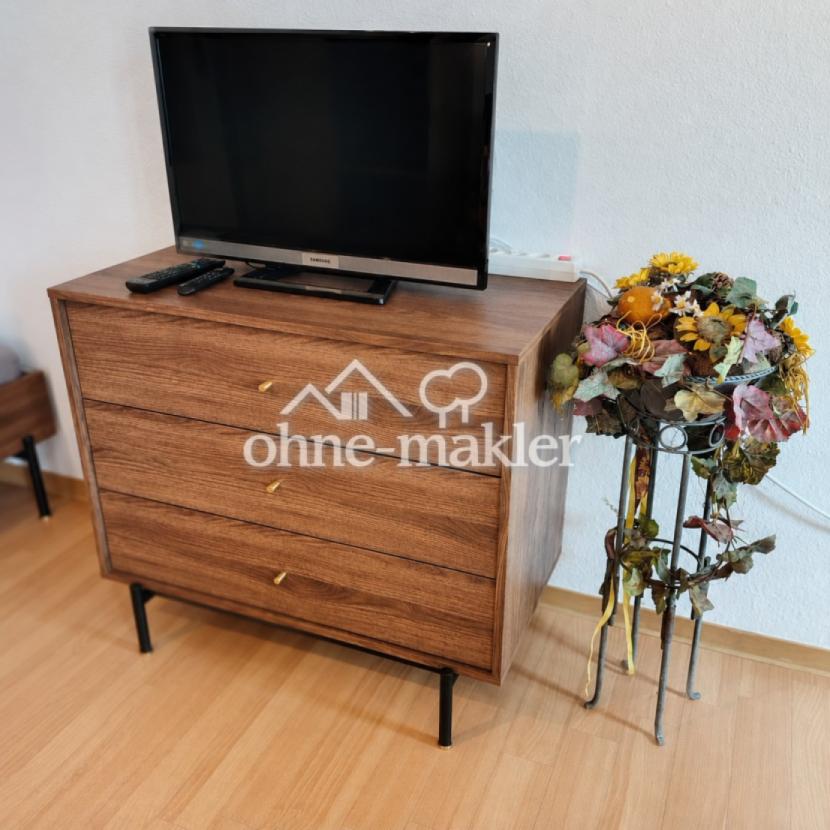 Kommode mit TV