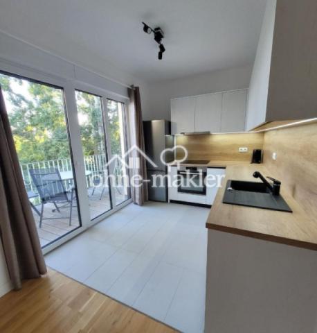 WG6/9 Wohnküche+Balkon