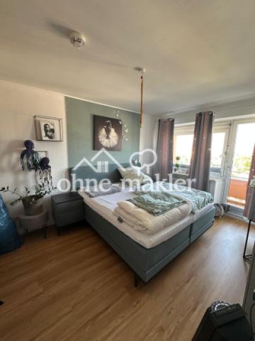 Schlafzimmer mit Balkon