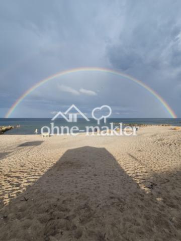 Regenbogen am Strand