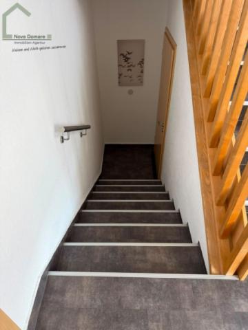 Treppe ins Obergeschoss
