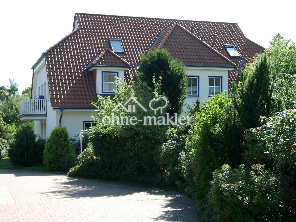 Haus mit Wohnung links unten