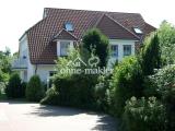 Haus mit Wohnung links unten