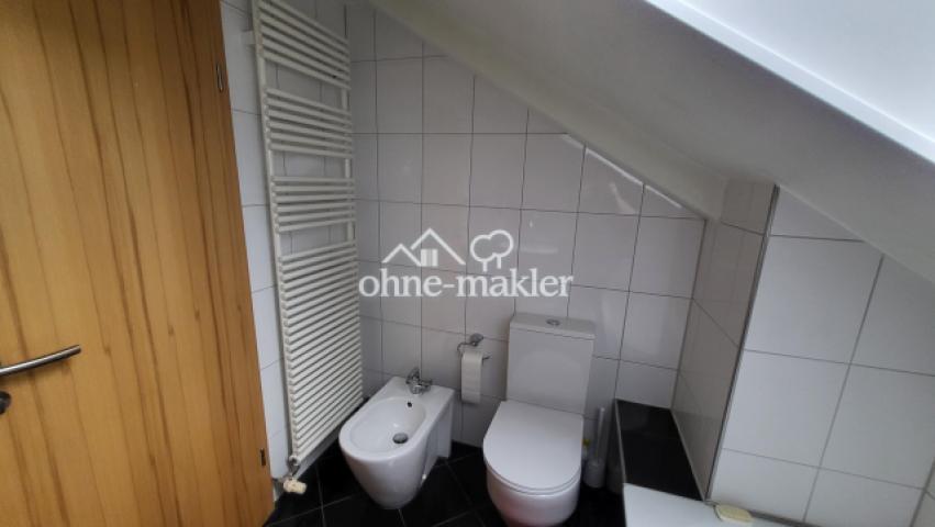 Bad OG mit Bidet und WC