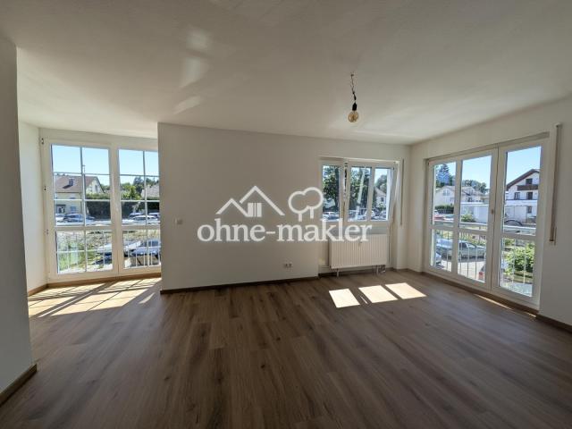 Wohnzimmer mit Wintergarten.