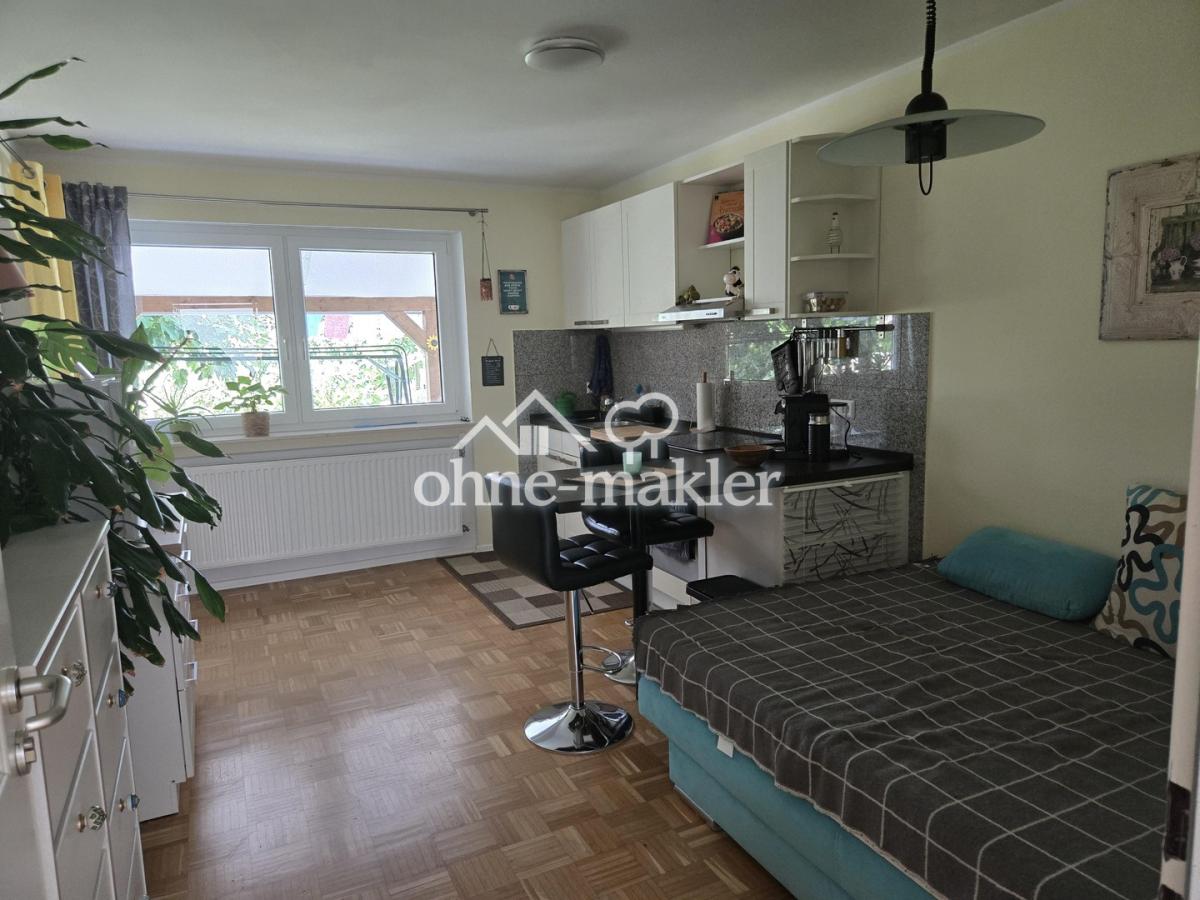 Zimmer 1 UG mit EBK 