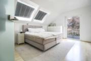 Schlafzimmer mit Dachterrassenzugang