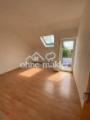 Wohnzimmer mit Balkon