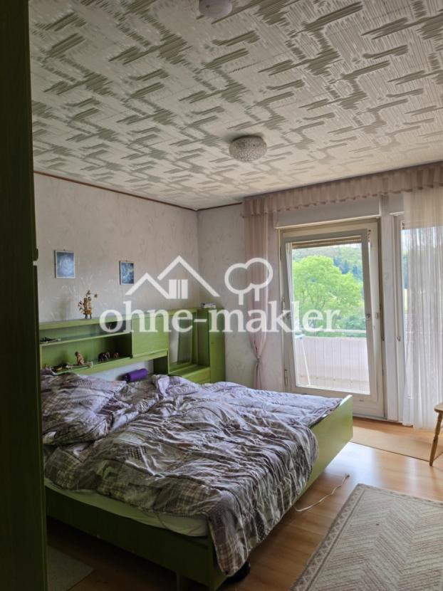 Schlafzimmer mit Balkonzugang