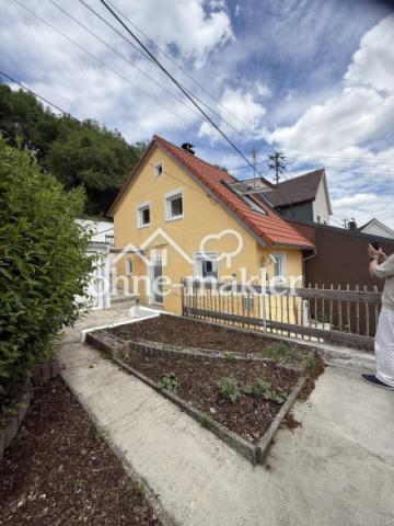 Haus mit Gemüsegarten