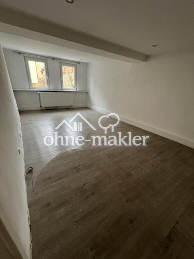 Wohnzimmer renoviert unten