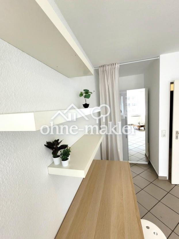 Arbeitsbereich u. Schrank