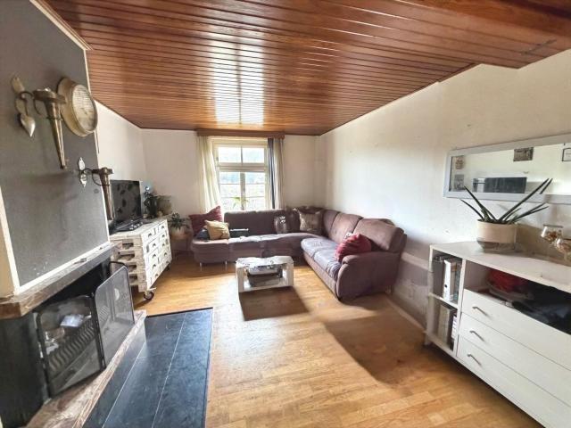 Wohnzimmer mit Kamin / EG