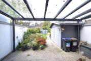 12 überdachte Terrasse